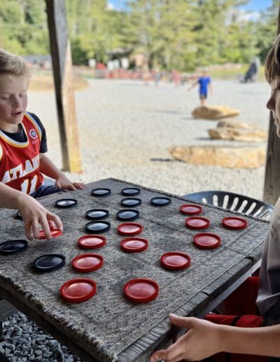 Boys playing outdoor games at Highlands Outpost near Brevard, NC.