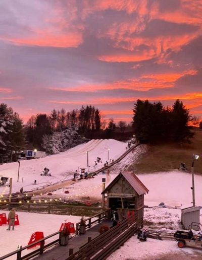 Snowtubing at sunset near Clemson, South Carolina.