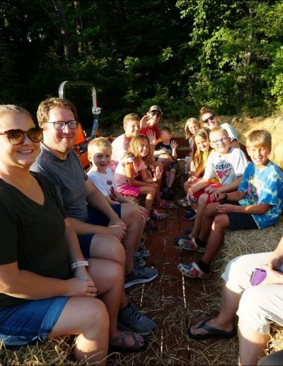 People enjoying scenic hayride at Black Bear Snow Tubing.