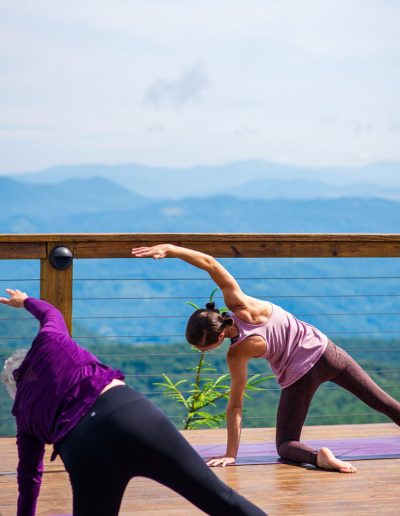 Women doing outdoor yoga near Boone, NC.