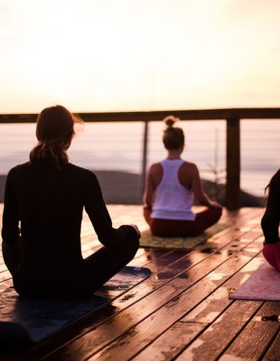 Women participating in outdoor yoga at Beech Mountain, near Banner Elk, NC.