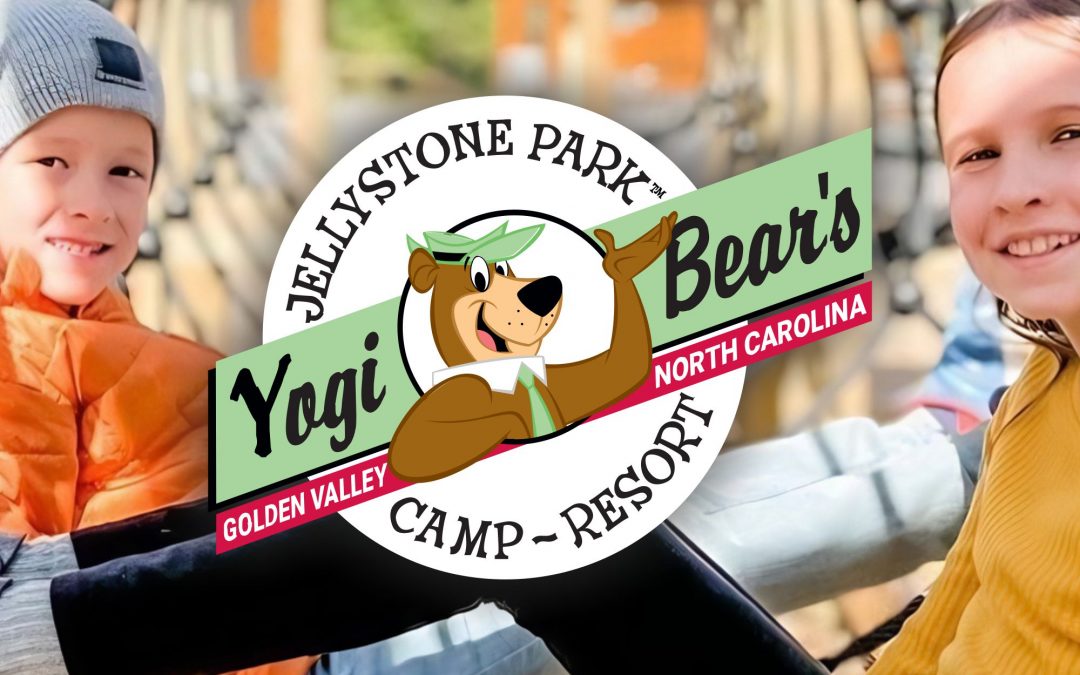 Children playing in ropes course tunnel at Jellystone Park near Boone, NC.