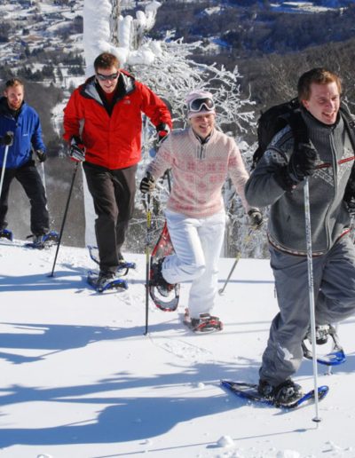 People snowshoeing at Sugar Mountain near Mountain City TN.