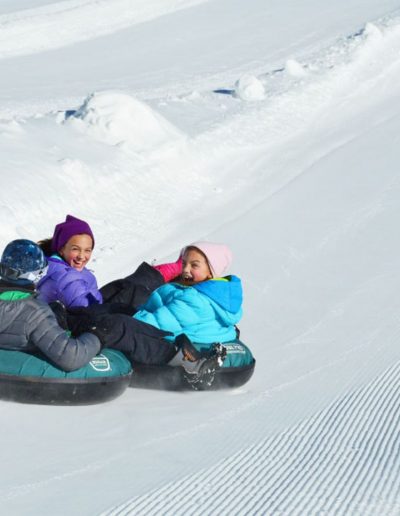 People snow tubing at Sugar Mountain resort near Boone, NC.