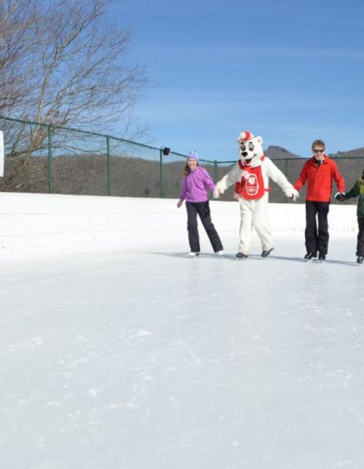People ice skating at Sugar Mountain resort near Boone, NC.