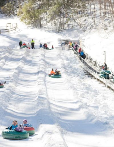 People snowboarding at Ski Sapphire in NC mountains.