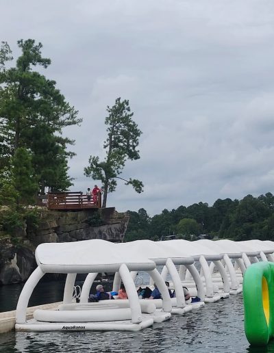 Fantasy Lake Wake Forest NC water park with floating slides and climbing obstacles