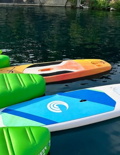 Guests enjoying SUP at Fantasy Lake Water Park in North Carolina