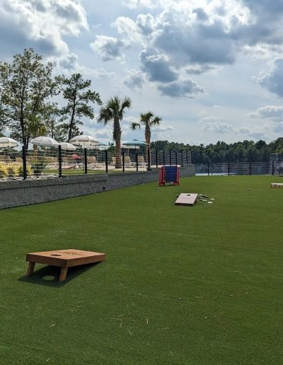 Wake Forest NC outdoor water park with floating inflatables and swimming beach