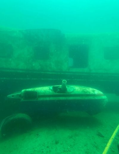 Divers entering the water at Fantasy Lake Scuba Park