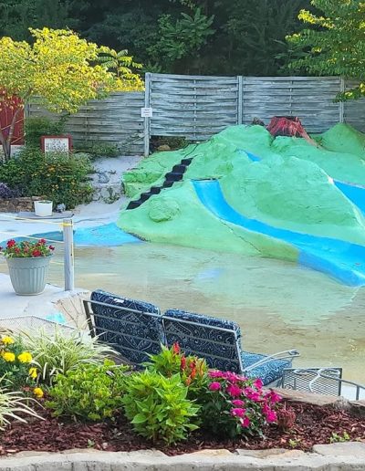 Families swimming in the naturally flowing water at Sun Crest Water Park in Taylorsville, NC