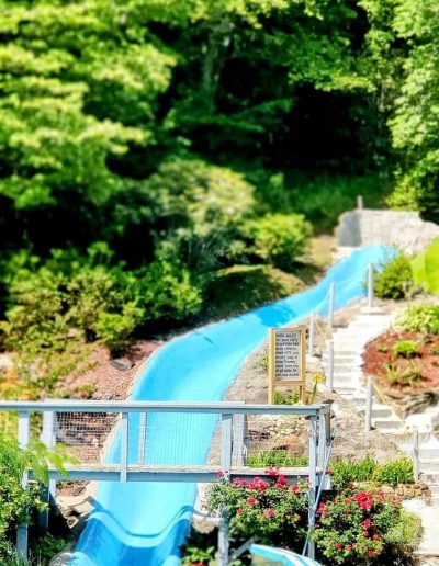 Natural outdoor pool and beach area at Sun Crest Water Park in Taylorsville, North Carolina