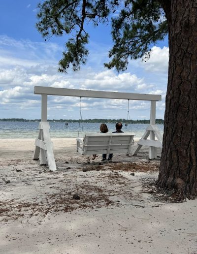 Camp Clearwater beach volleyball near the lake