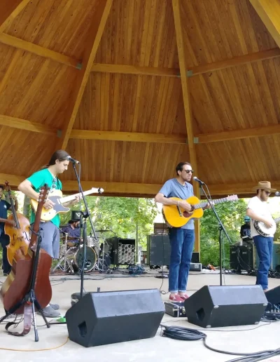 Live band performing at the Burlington City Park amphitheater.