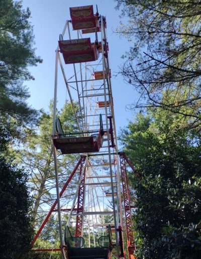 Ferris wheel rising above trees at Santa’s Land in Cherokee, NC