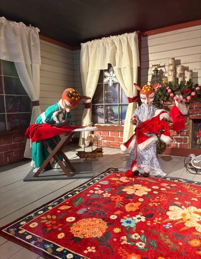 Christmas display with costumed reindeer figures inside Santa’s Land in Cherokee, NC