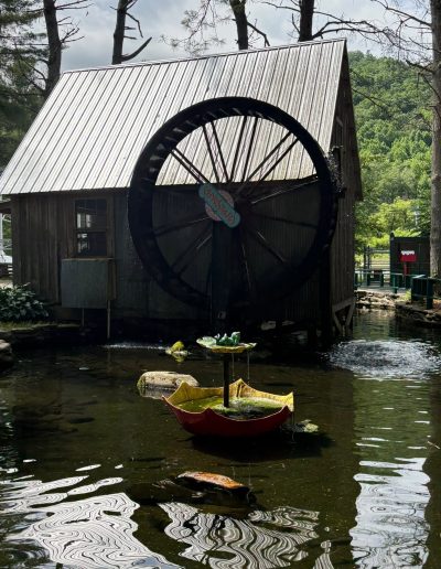 Water wheel beside a rustic mill at Santa’s Land in Cherokee, NC