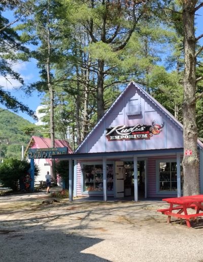 Wooded park building and picnic table at Santa’s Land in Cherokee, NC