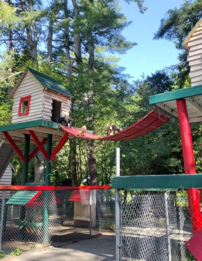 Elevated animal enclosures connected by a walkway at Santa’s Land Zoo in Cherokee, NC