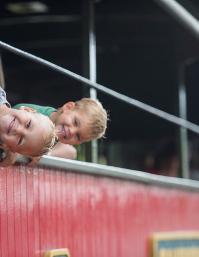 Children riding in an open train car at Tweetsie Railroad