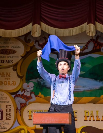 Magician performing on stage at Tweetsie Railroad