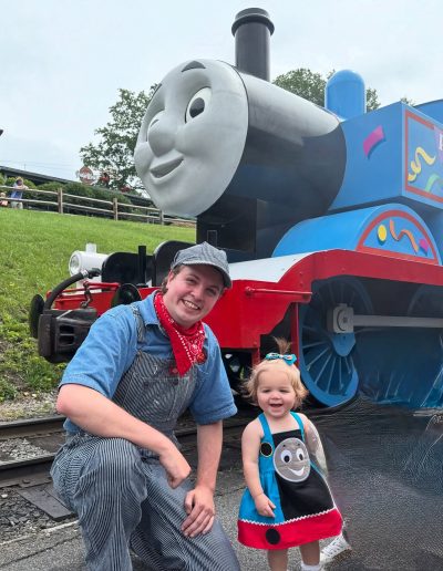 Family posing with Thomas the Tank Engine at Tweetsie Railroad