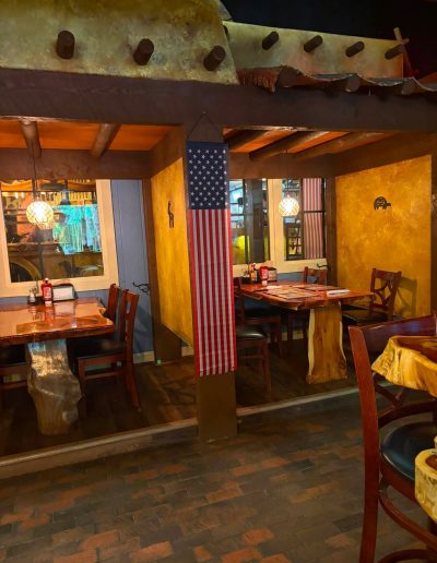 Restaurant seating and American flag at Deadwood near Williamston, NC