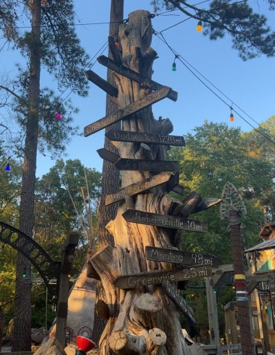 Carved wooden figure among pine trees at Deadwood near Williamston, NC
