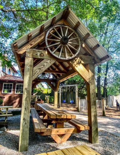 Wooden pavilion with wagon-wheel decoration at Deadwood near Williamston, NC