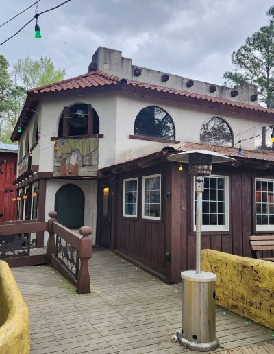 Arched Western-style building and boardwalk at Deadwood near Williamston, NC