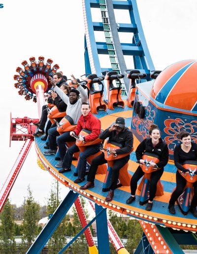 Disk’O gondola climbing its curved blue track at Frankie's of Charlotte in Huntersville, NC.