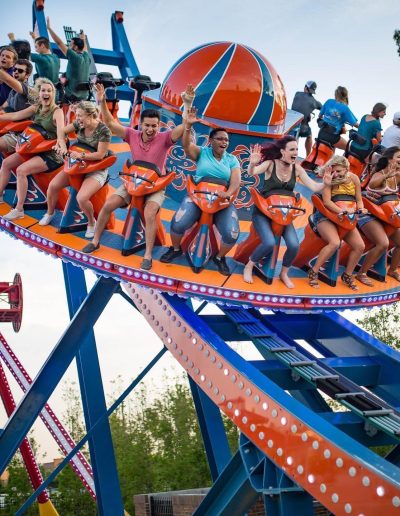 Riders on the orange Disk’O gondola at Frankie's of Charlotte in Huntersville, near Mooresville.