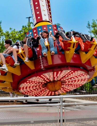 Riders seated on the Discovery gondola outdoors at Frankie's of Charlotte in Huntersville, NC.