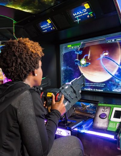 Two visitors playing a Halo arcade game at Frankie's of Charlotte in Huntersville, NC.