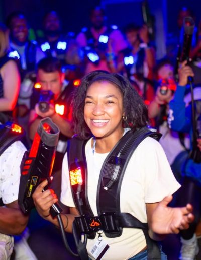 Laser tag group wearing illuminated vests at Frankie's of Charlotte in Huntersville, near Kannapolis.