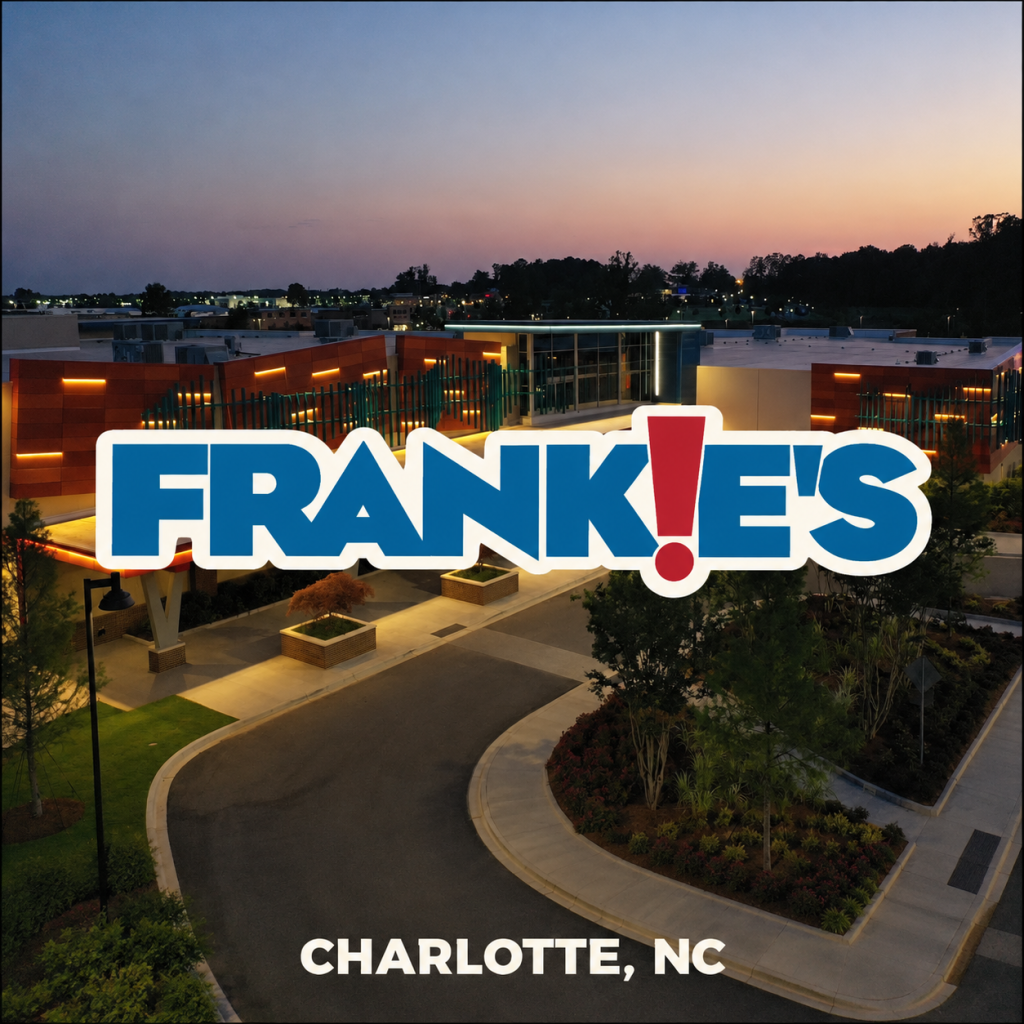Frankie’s logo centered over its Charlotte-area entertainment center at sunset in Huntersville, NC.
