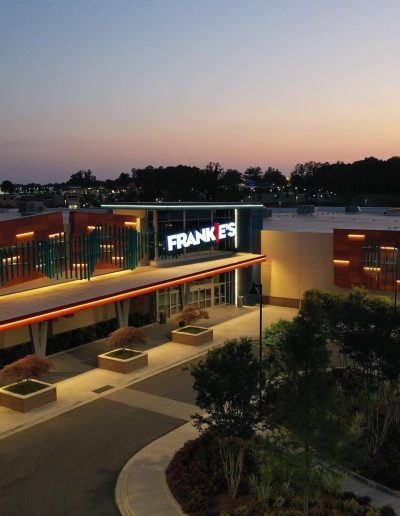 Frankie’s illuminated entrance at sunset at Frankie's of Charlotte in Huntersville, NC.