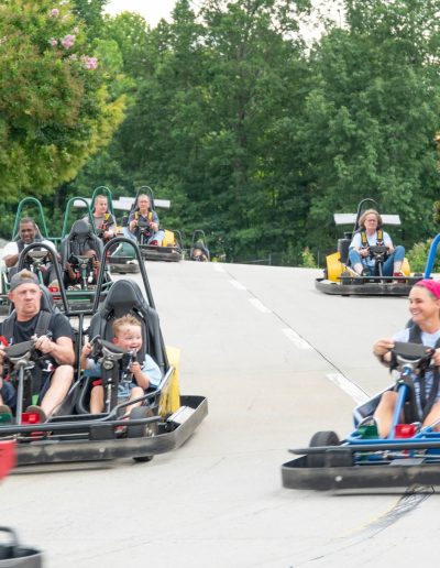 Go-kart racers approaching a bend at Frankie's of Charlotte in Huntersville, NC.