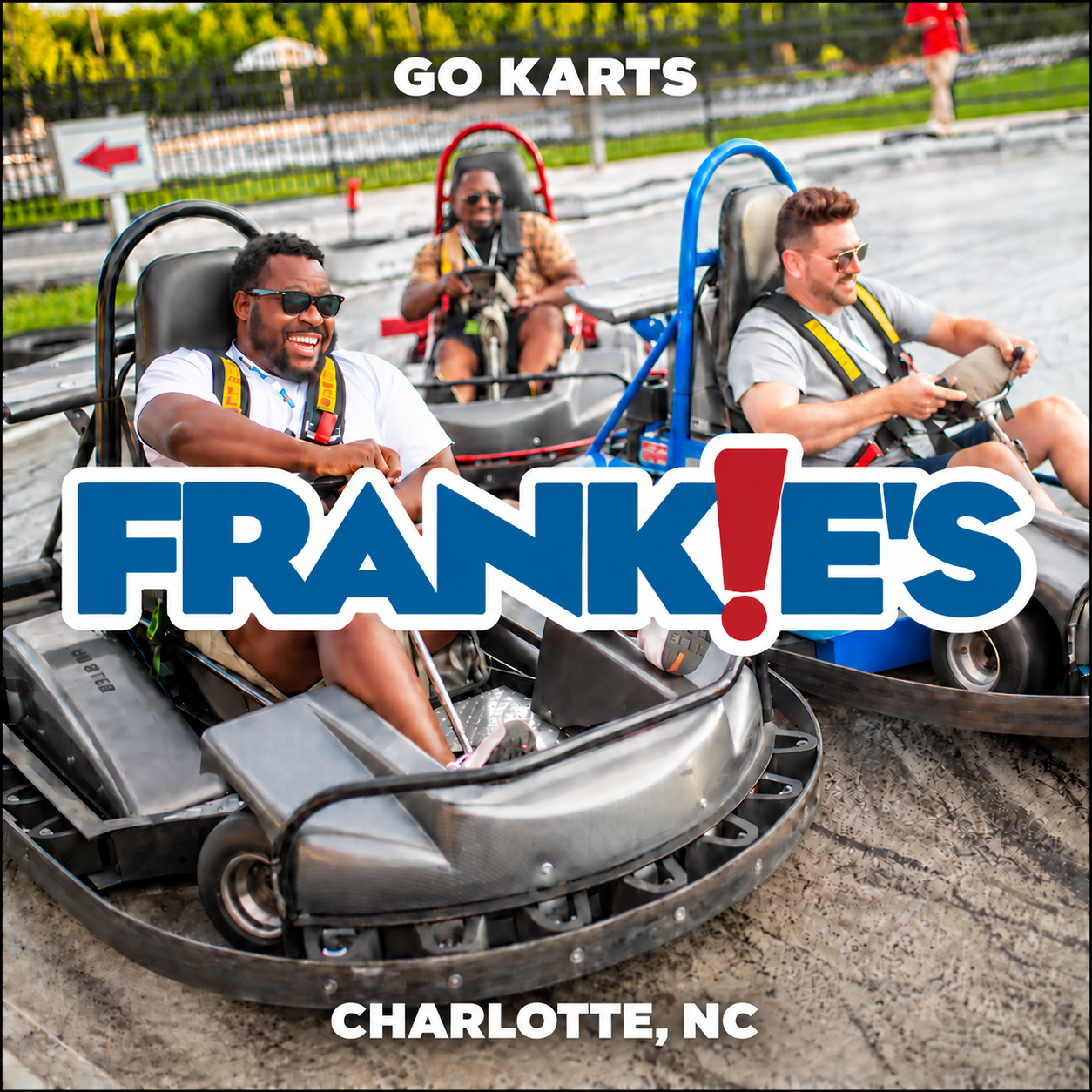 Frankie’s logo centered over go-kart racers at Frankie’s Charlotte in Huntersville, NC.