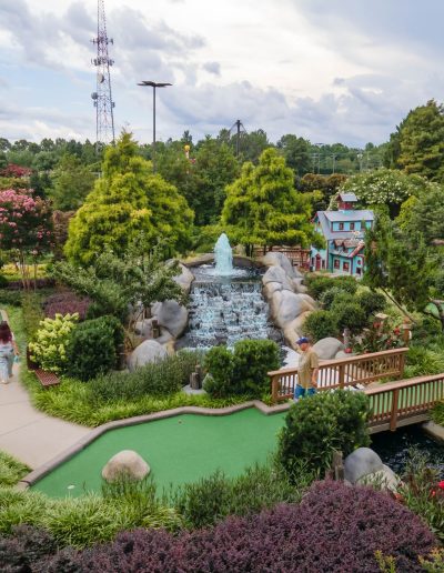 Mini-golf greens, waterfall and wooden bridge at Frankie's of Charlotte in Huntersville, NC.