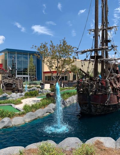 Pirate ship and fountain on the mini-golf course at Frankie's of Charlotte in Huntersville, NC.